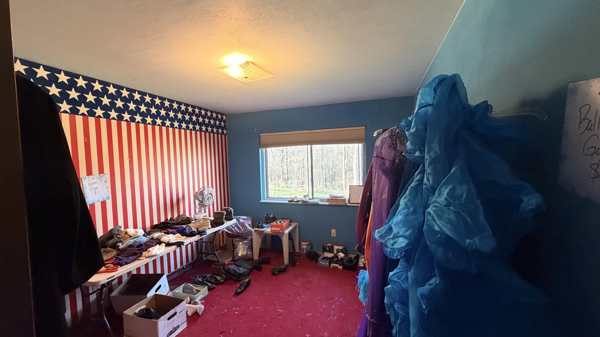 American flag wall bedroom ball gowns shoes at an estate sale O'Fallon