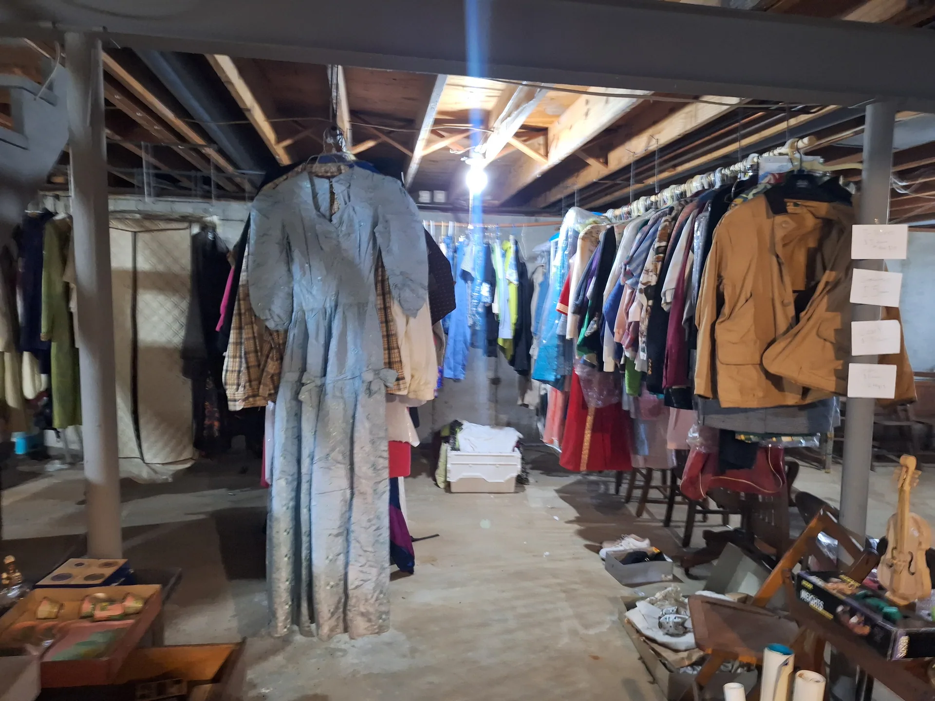 Gallery/basement vintage clothing racks at an estate sale O'Fallon