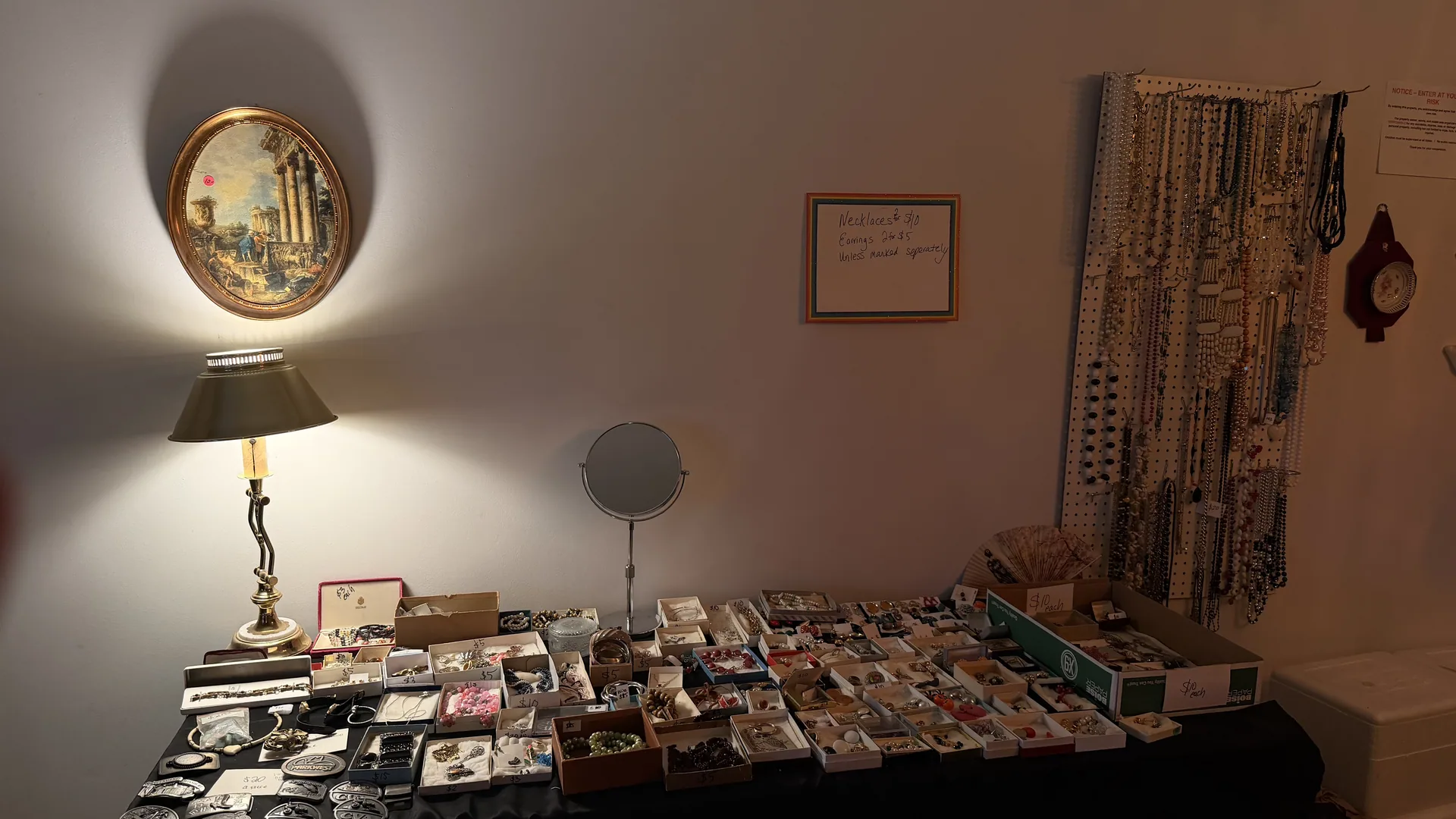 Jewelry table necklace pegboard at an estate sale O'Fallon