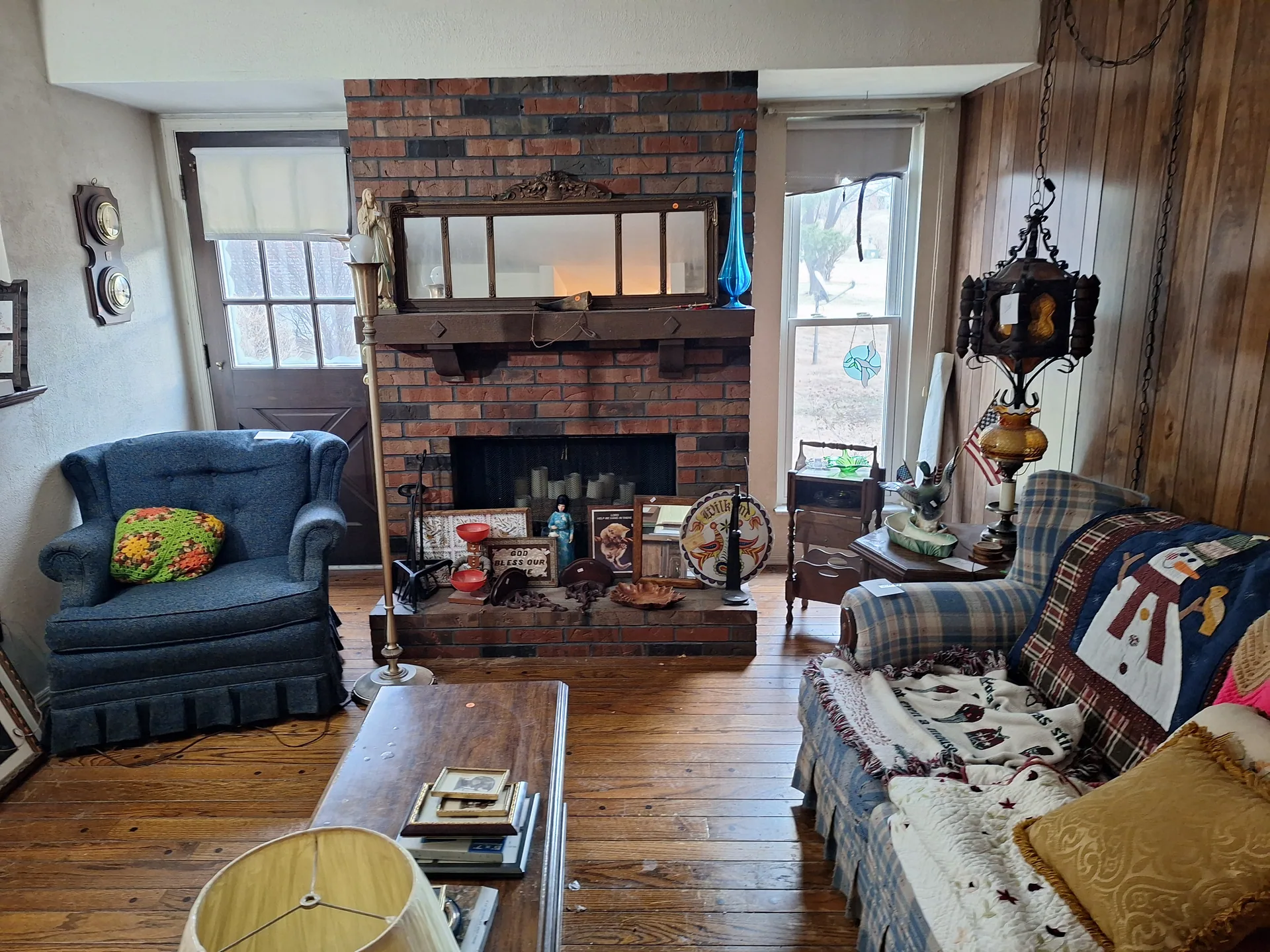 Living room brick fireplace armchair at an estate sale O'Fallon